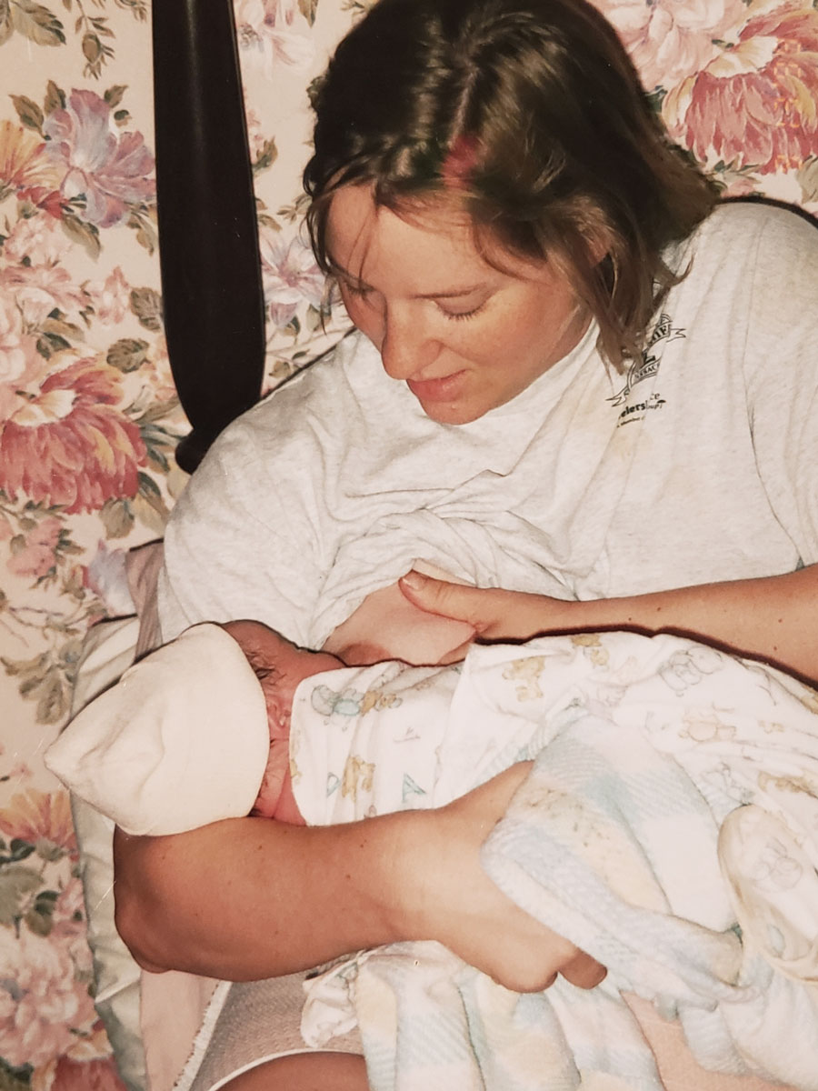 Joyce nursing her newborn